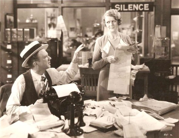 Displaying her signature doubtful smirk in "Blessed Event" with Lee Tracy